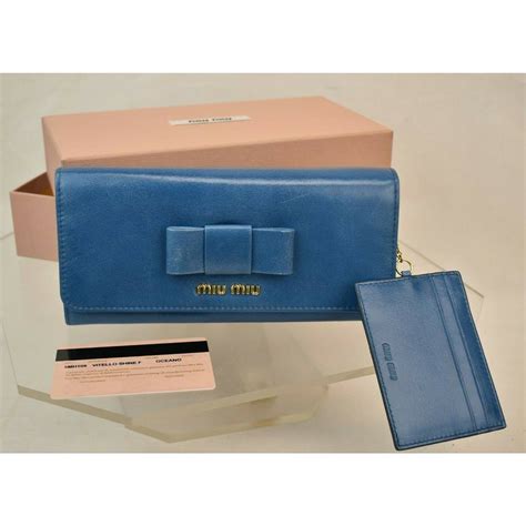 miu miu pink bow wallet|Miu Miu Madras Leather bow.